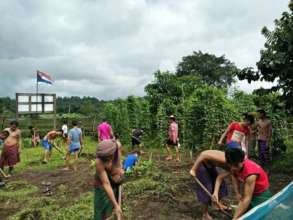 Clients working in the DARE Organic Gardens