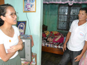 Ai, our 2016 Peace Fellow, comforts Mr Duc