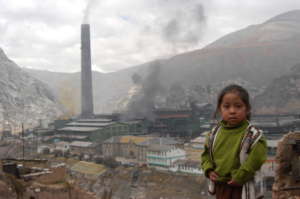 Isabel in front of the smelter in 2008. / G. Koren