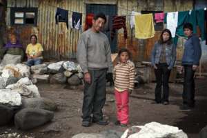 Family in La Oroya. | Credit: Giuliano Koren