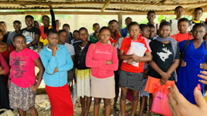 Girls listening to Ms. Nenne about the topics