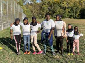 Somali Bantu girls stand before a session