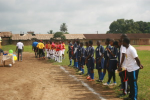 Both teams line up before kick off