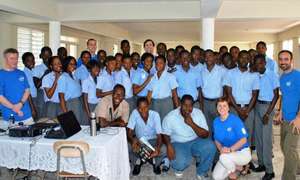 The IESC team with students and teachers in Haiti
