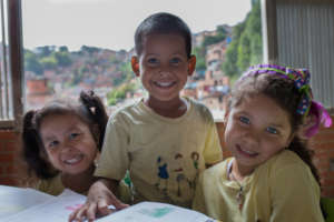 Kindergarten students - background: Petare slum
