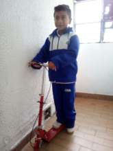 Juan Pablo with his new scooter