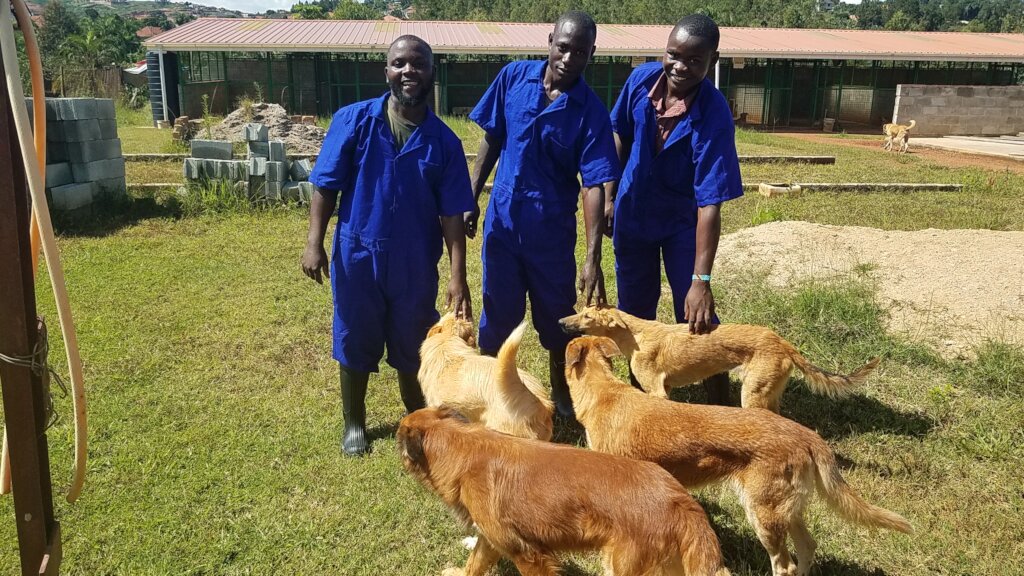 Showing off their new uniforms at the new shelter