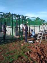 April 27: Construction workers putting up the pens