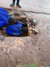 Going into the culvert to get the puppies out