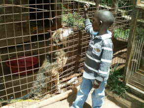 Alex Ochieng's son with Hope-2013