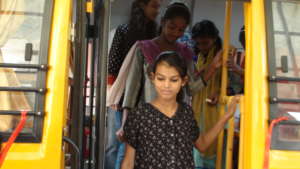 The girls of the EOW project inside the new bus.
