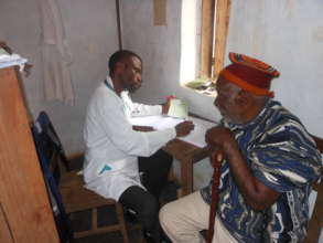 Dr. Tembon Consulting a Patient at Ngemsibo