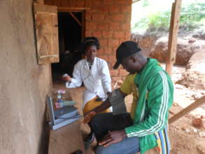 Lab Technician Jam attends to Patient at Ngemsibo