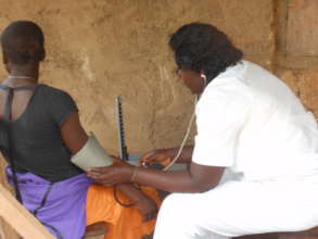 Midwife Lambe Consults Expecting Mother atNgemsibo