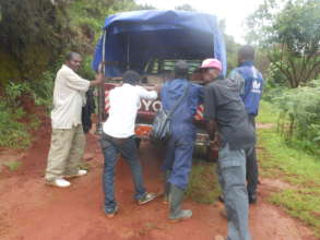 RECEADIT Truck Stuck in Mud on its Muteff Trip.