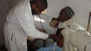 Dr. Tembon Consulting a Patient at Ngemsibo