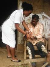 Nurse Che Consults elderly patient at Home