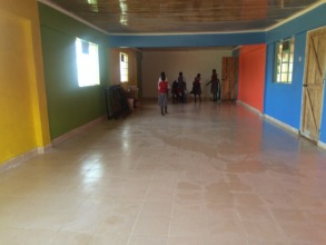 4th graders cleaning the dorm to welcome new girls