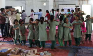 Class III lead a song during Teacher Training