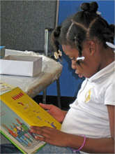 Girl learning to read