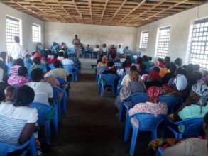 Dr. GK Mbuguah speaking to the parents