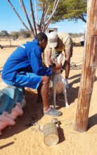 CCF Staff Giving the 1,000 Vaccination