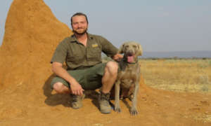 CCF Staff Tim Hofmann and Scat Detection Dog Ole