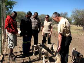 Farmers recieve their puppies