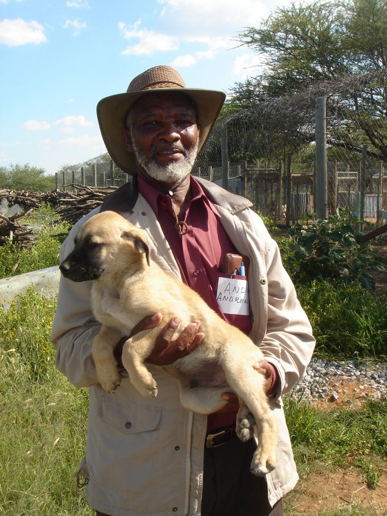 Namibian farmer with pup