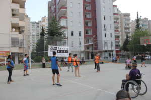 Refugee and Turkish children playing volleyball