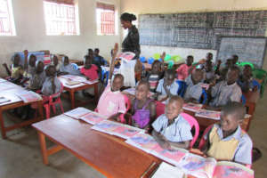 Kindergarteners reading zebra book in new building