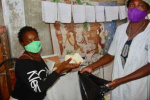 Distributing hygiene items at Sous Kanaran School.