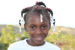 Beatrice is free, back home, and in school now.