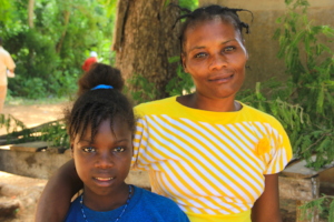 Emeline & her mom. Emeline is free thanks to you.