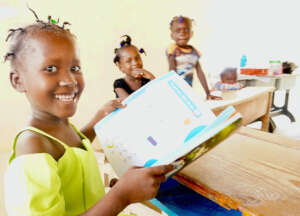 Creole textbooks are prioritized for children.