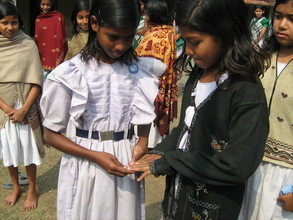 Peers checking proper nail cutting techniques