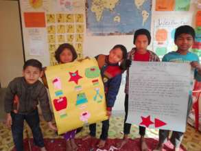 Children in Dhading showing off their art skills