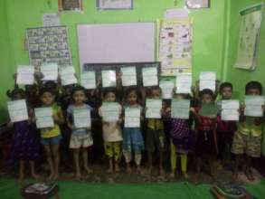 Holding their report cards