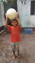 Farha with her beloved ball