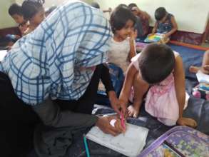 a dedicated teacher & her student!