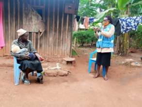 A CHV education a mother on Maternal and Neonatal
