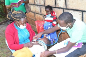 HopeCore's clinician attending to a child