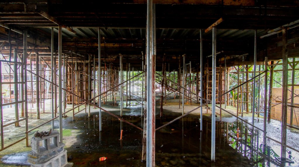 water from strong monsoon rains floods the site