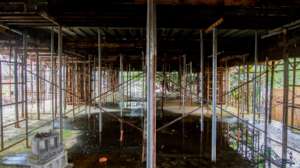 water from strong monsoon rains floods the site