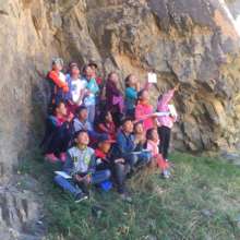 Eco-Camp participants looking up at an Ibex herd