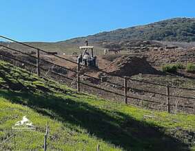 Filling a deep ravine from erosion caused by storm