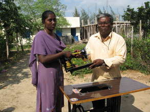 Father Giving Sewing Machine to Sobana