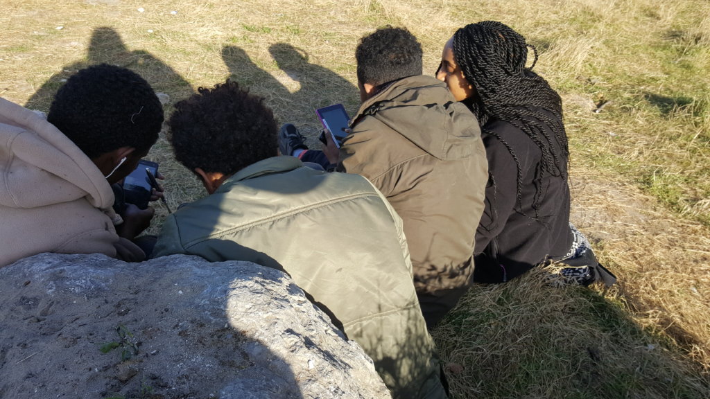 Conducting interviews with youth in Calais