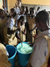 Girls Learning to Make Liquid Soap