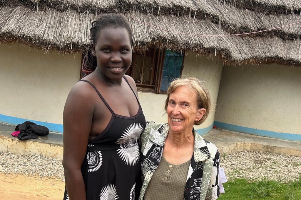 Graduate Susan Ellie with OU President - Aug. 2025